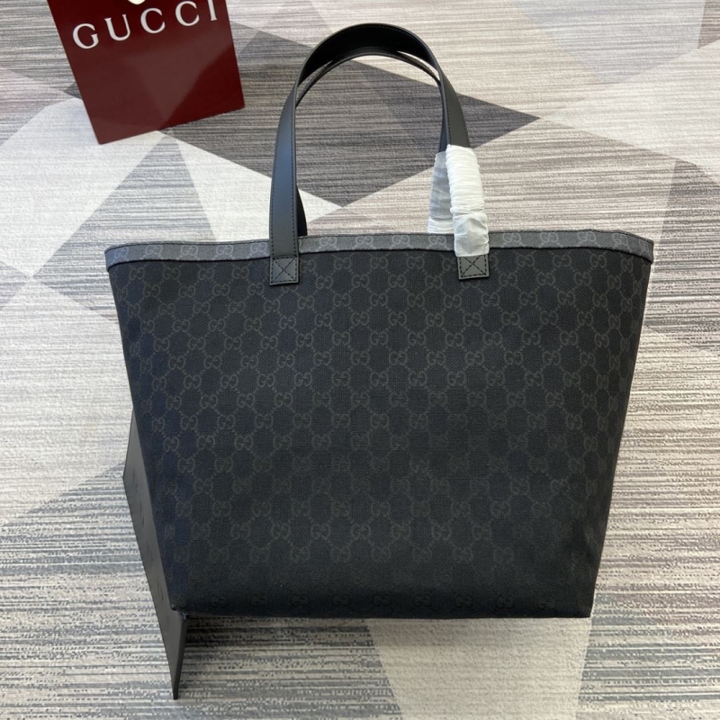 G*u*i shopping bags